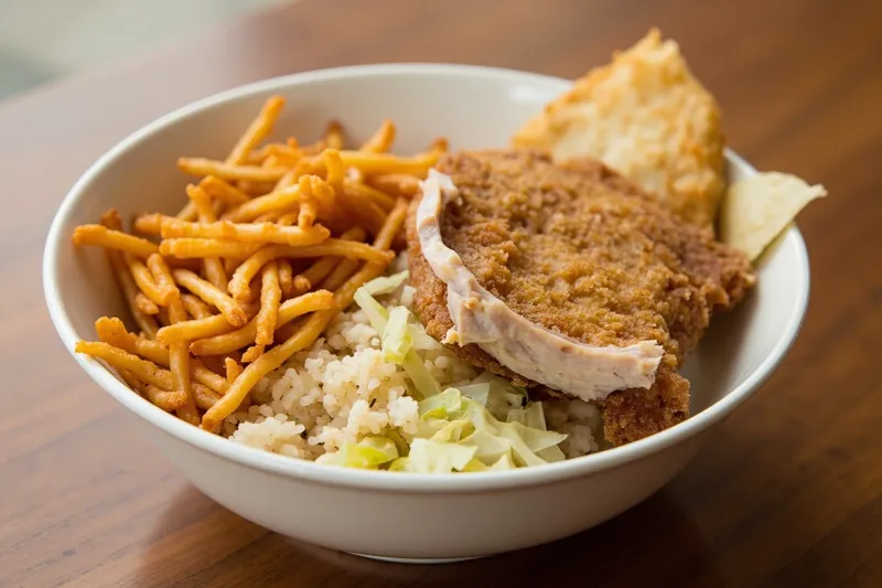 Katsudon bowl with breaded pork cutlet, cabbage, rice and miso soup